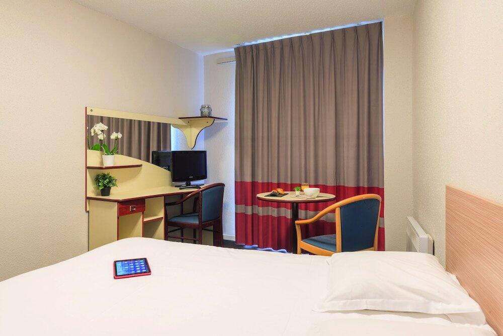 Foto de una habitación de Appart&amp;#039;City Classic Nantes Viarme