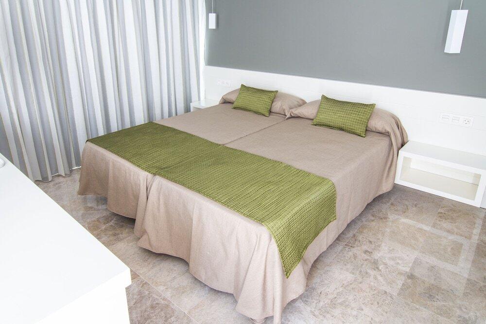 Foto de una habitación de Hotel Senderos