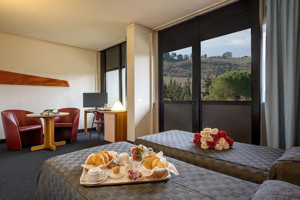 Foto de una habitación de Albornoz Palace Hotel