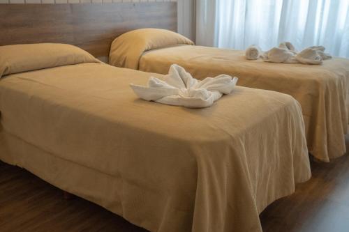 Foto de una habitación de Tangoinn Club Hotel