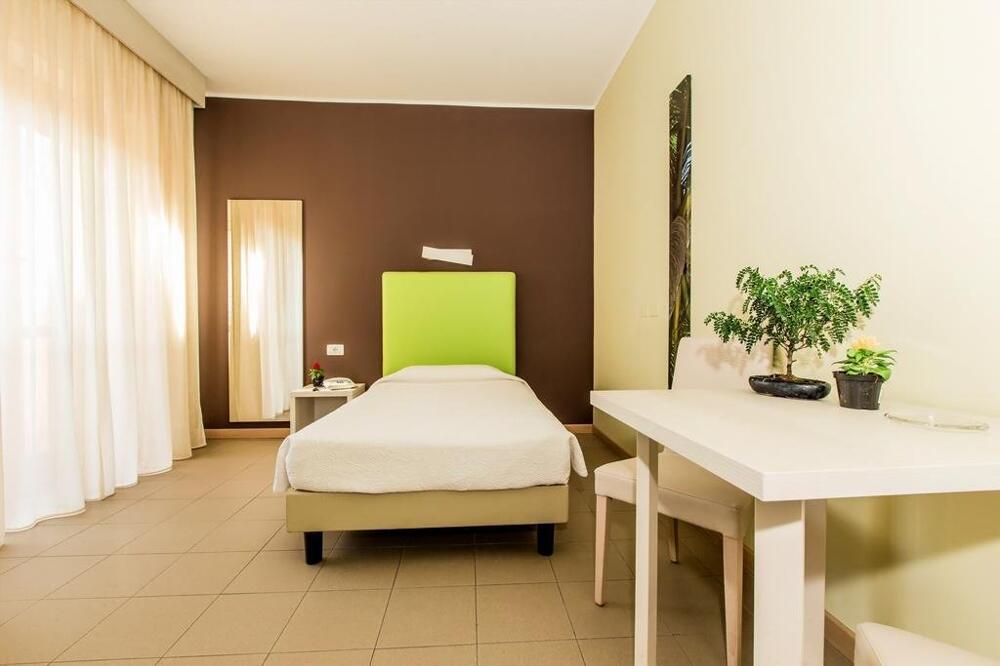 Foto de una habitación de Hotel Residence Ulivi E Palme