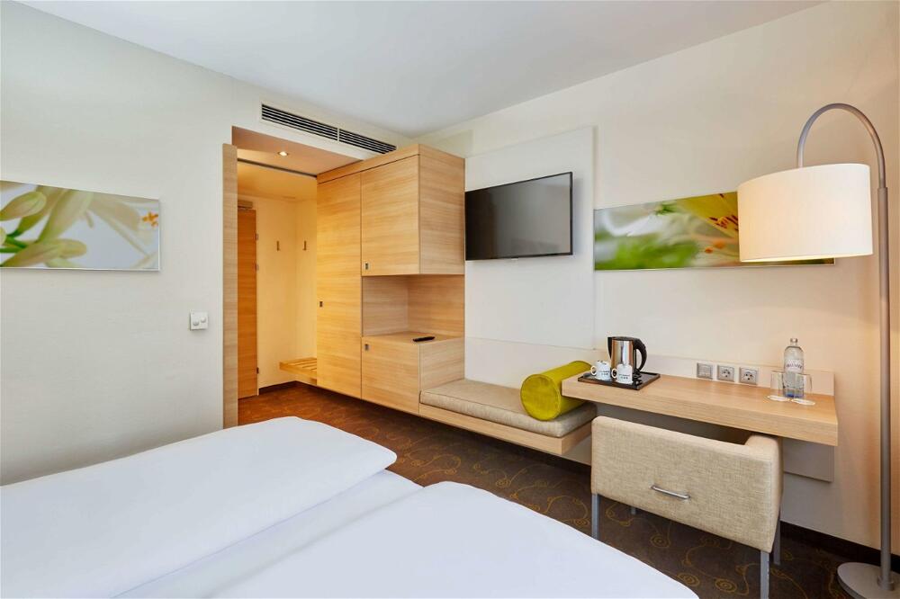 Foto de una habitación de H+ Hotel Salzburg
