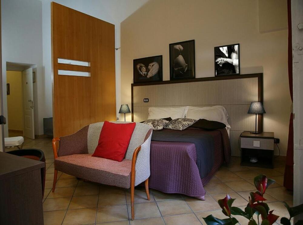 Foto de una habitación de Caravaggio Hotel