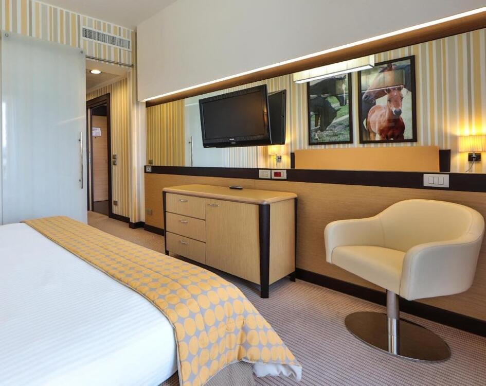 Foto de una habitación de UNAHOTELS Varese