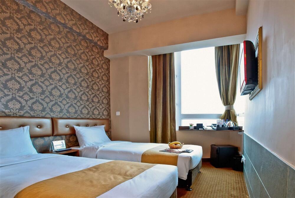 Foto de una habitación de Hotel Ramada Hong Kong Harbour View