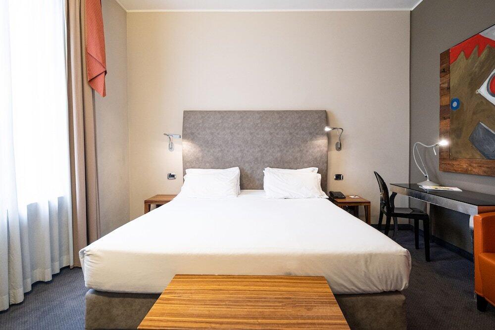 Foto de una habitación de Settecento Hotel