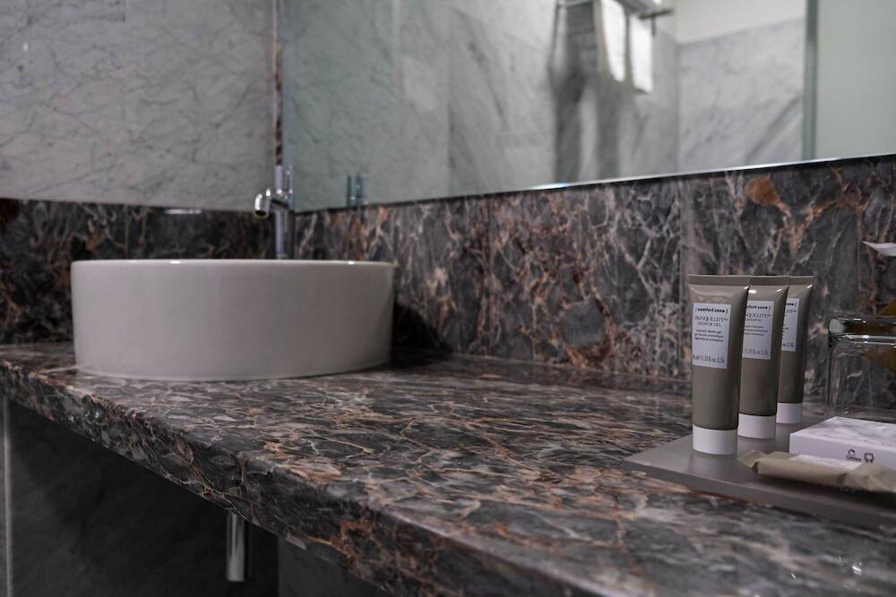 Foto del baño de Settecento Hotel