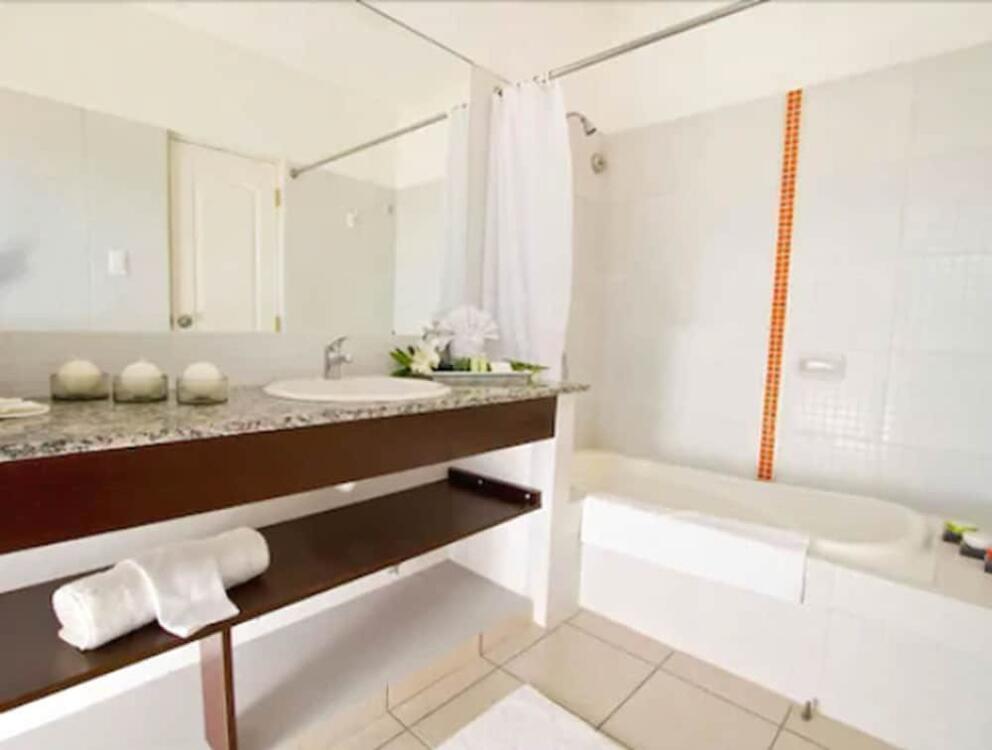 Foto del baño de Aparthotel Terranova Suites