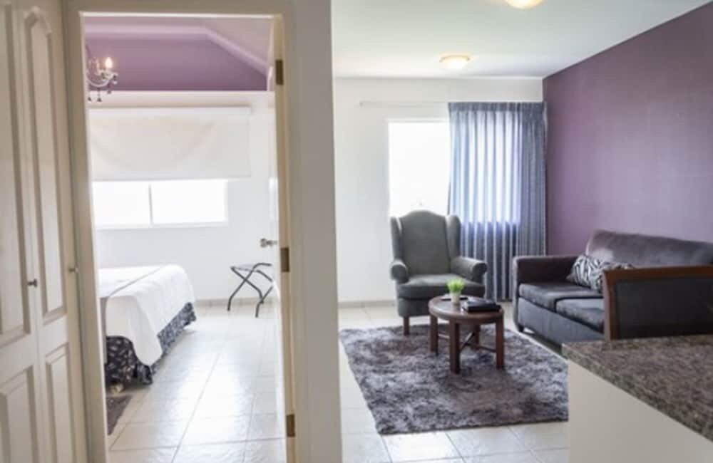 Foto de una habitación de Aparthotel Terranova Suites