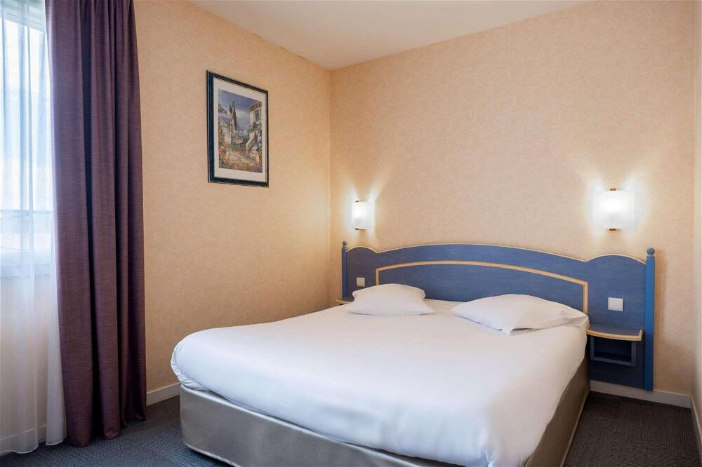 Foto de una habitación de Comfort Hotel Saintes
