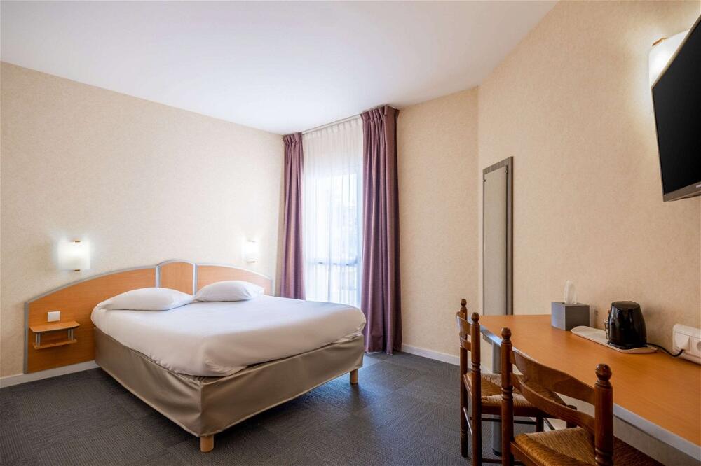 Foto de una habitación de Comfort Hotel Saintes