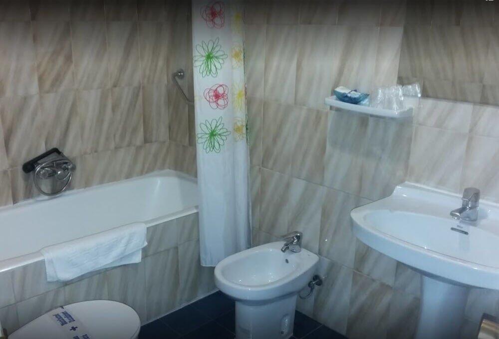 Foto del baño de Hostal Comercio