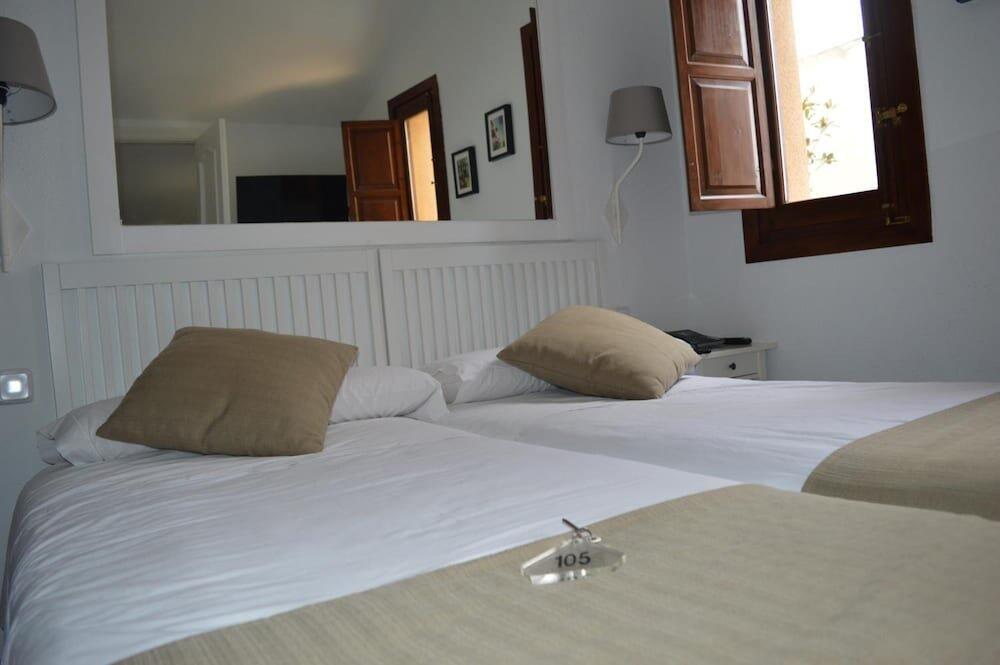 Foto de una habitación de Miguel De Cervantes