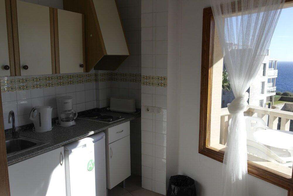 Foto de una habitación de Cala Figuera Apartments