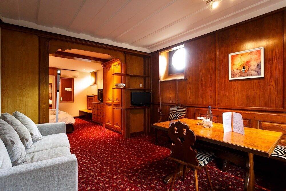 Foto de una habitación de Hotel - Restaurant Le Cerf &amp;amp; Spa