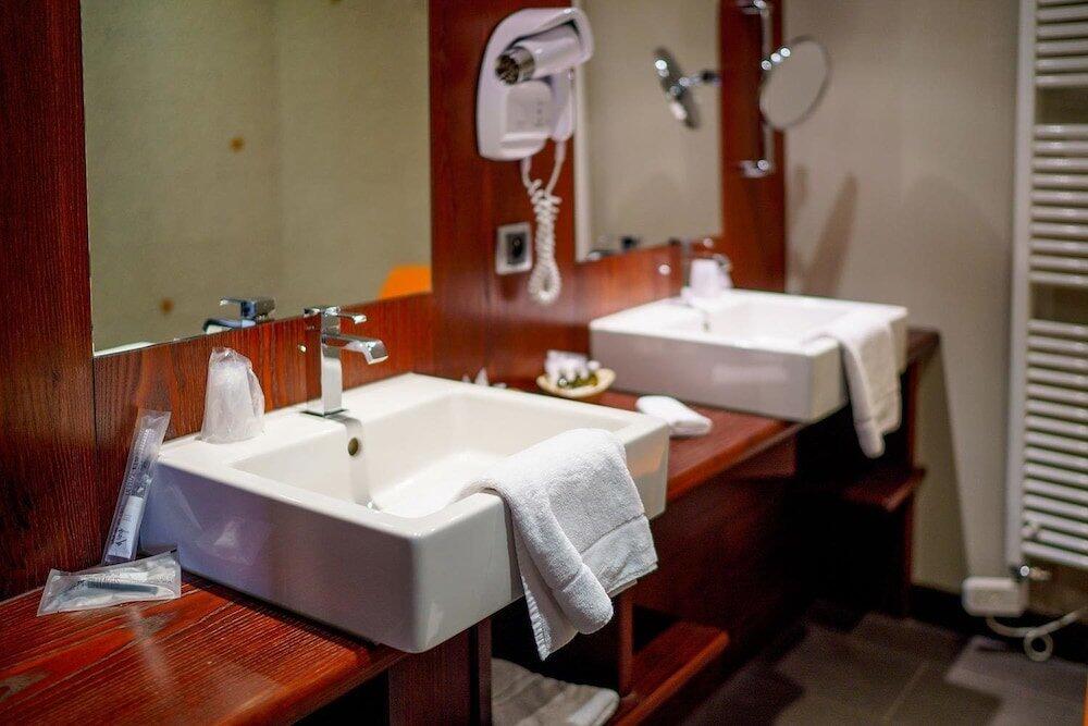 Foto del baño de Hotel - Restaurant Le Cerf &amp;amp; Spa