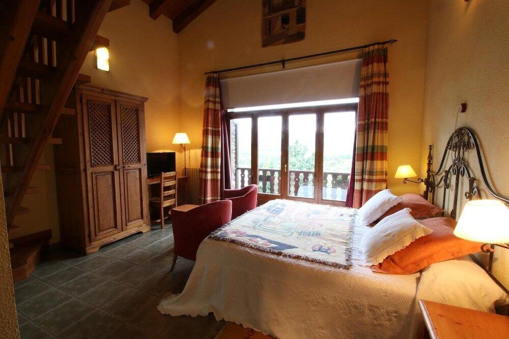 Foto de una habitación de Hotel Mas D&amp;#039;en Roqueta