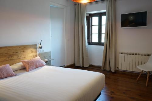 Foto de una habitación de Hotel Fonda Biayna