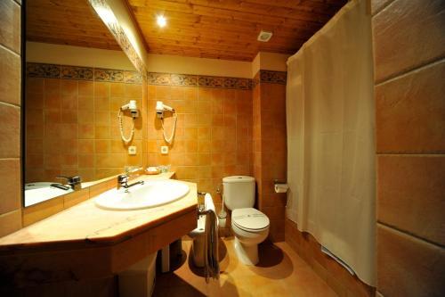 Foto del baño de Hotel La Morera