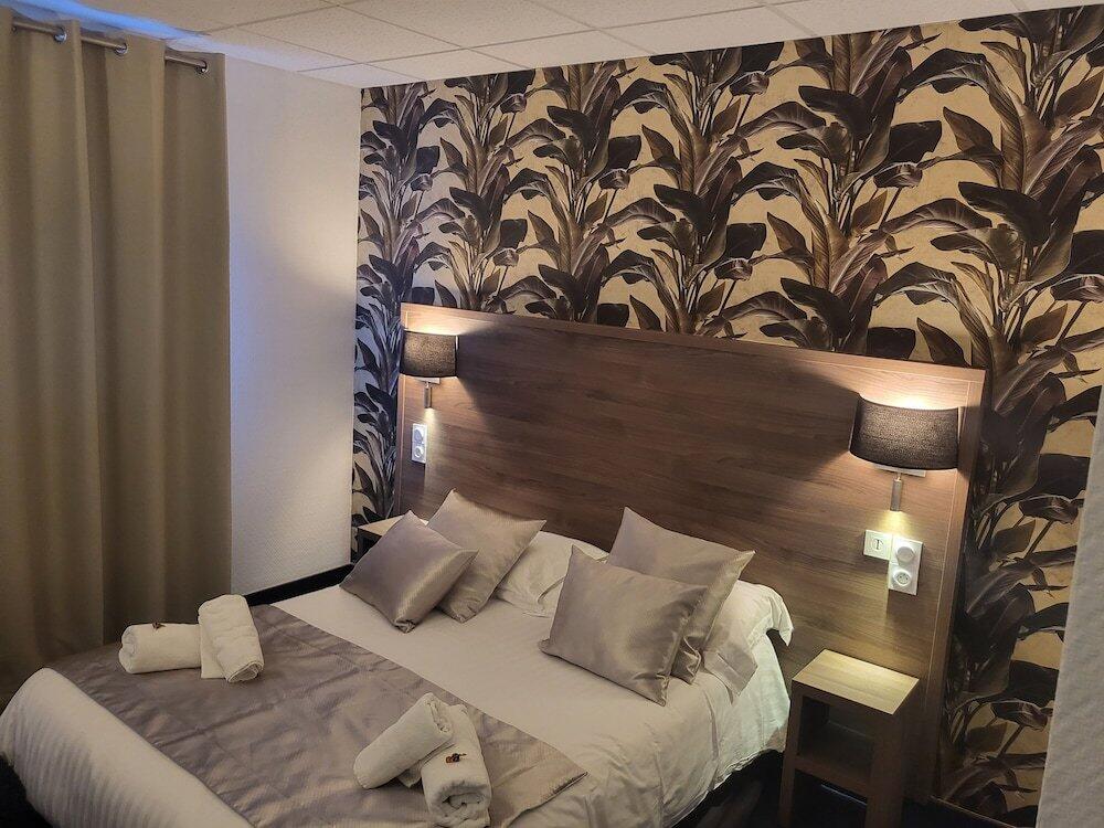 Foto de una habitación de Hotel Le Patio De La Dordogne
