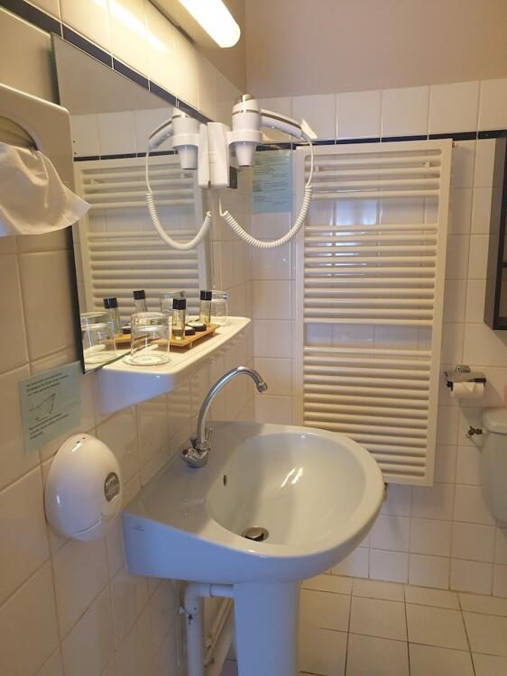 Foto del baño de Hotel Le Patio De La Dordogne