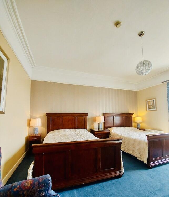 Foto de una habitación de Hostal Belvedere Lodge