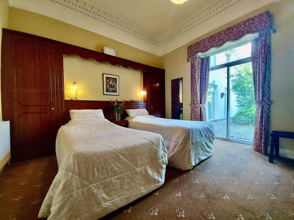 Foto de una habitación de Hostal Belvedere Lodge