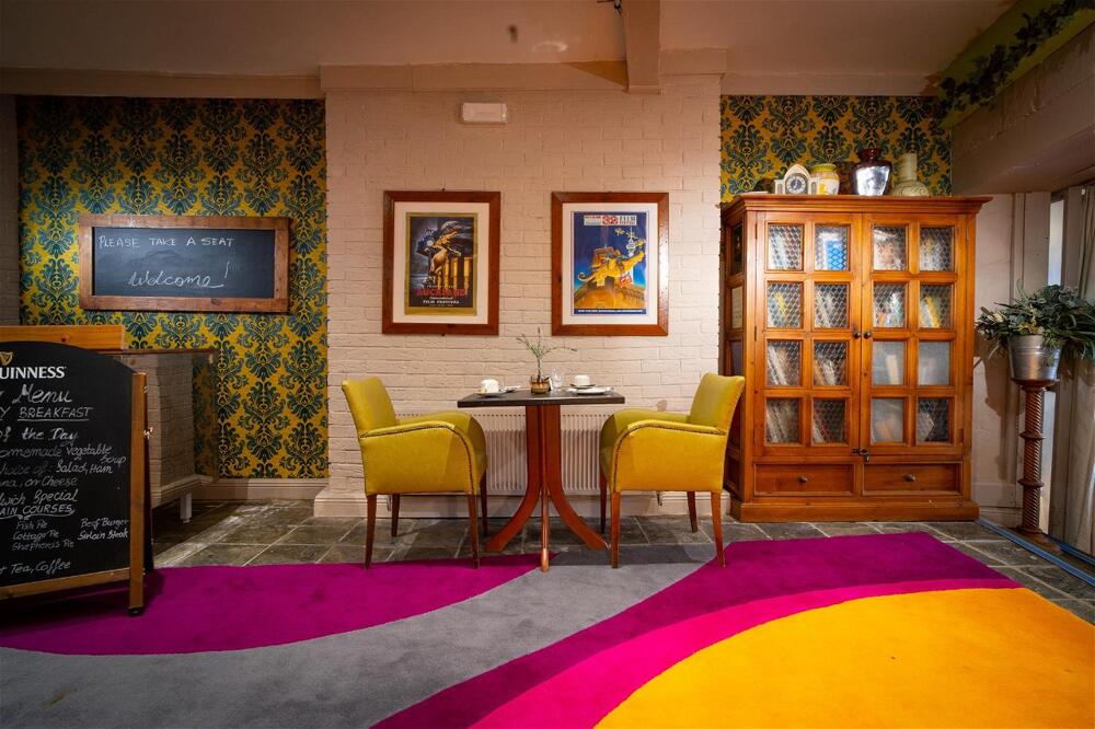 Foto de restauración de Ashley Hotel