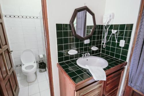 Foto del baño de Hotel Tres Banderas