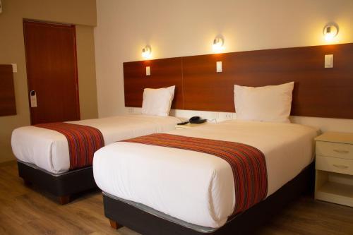 Foto de una habitación de Hotel San Pedro Plaza