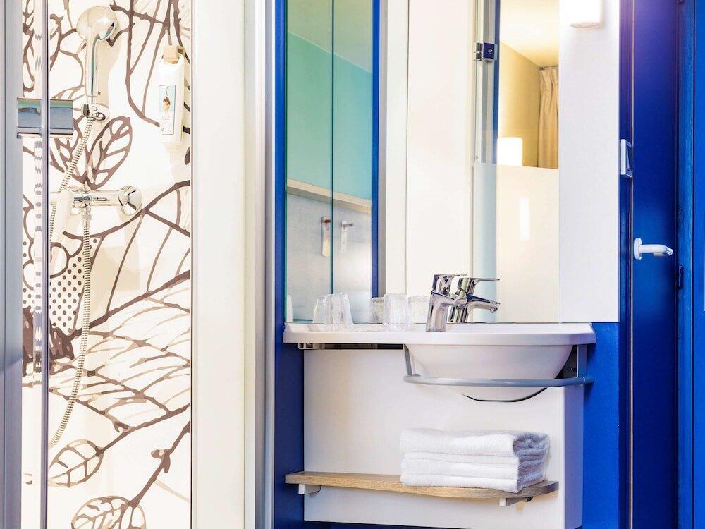 Foto de una habitación de Hotel ibis budget Luxembourg Aéroport