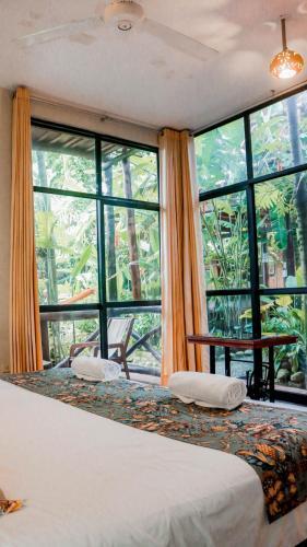 Foto de una habitación de Hotel La Patarashca