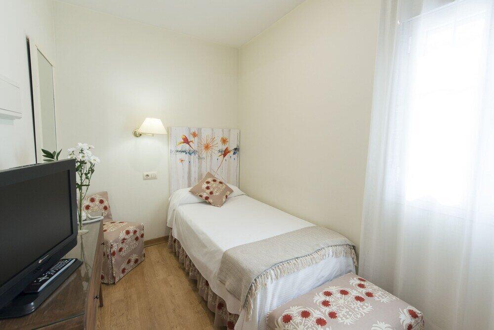 Foto de una habitación de Hotel Alcántara