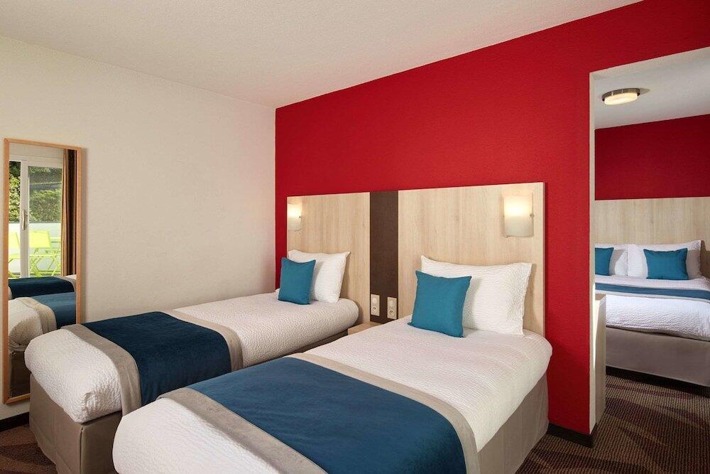 Foto de una habitación de Hôtel Roissy