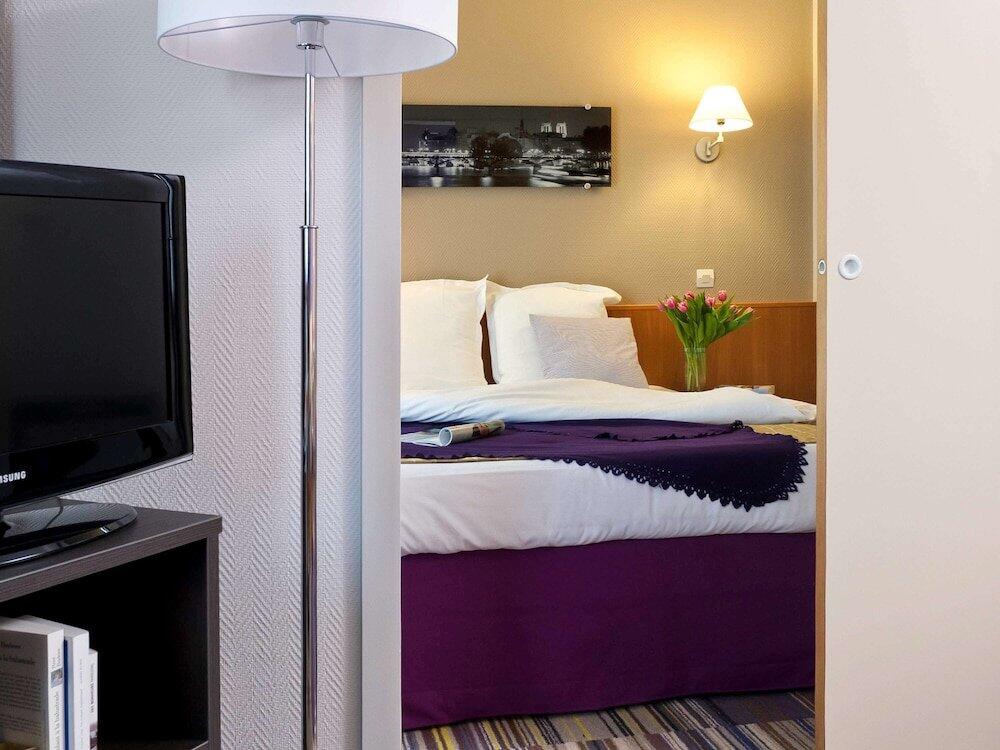 Foto de una habitación de Aparthotel Adagio La Défense Le Parc