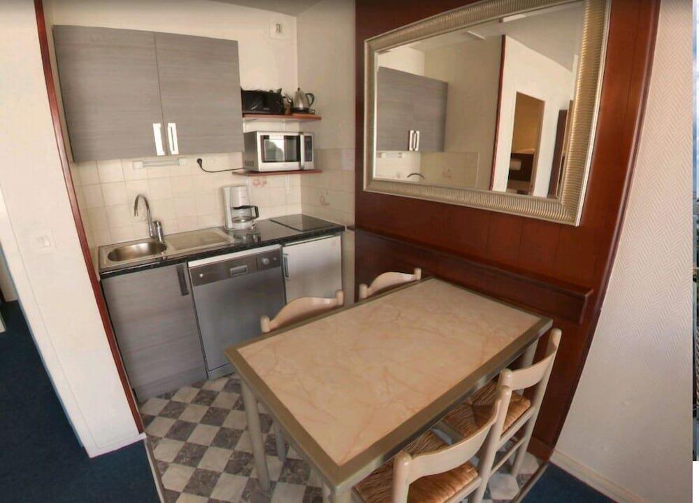 Foto de una habitación de Appart-Hôtel Le Trianon