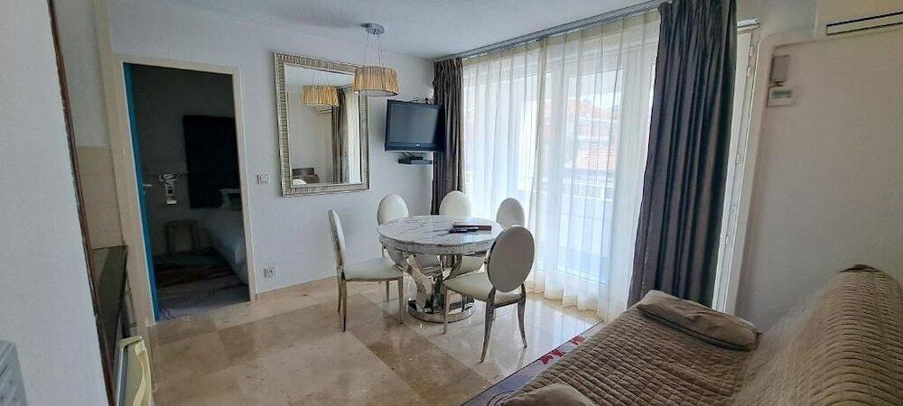 Foto de una habitación de Appart-Hôtel Le Trianon