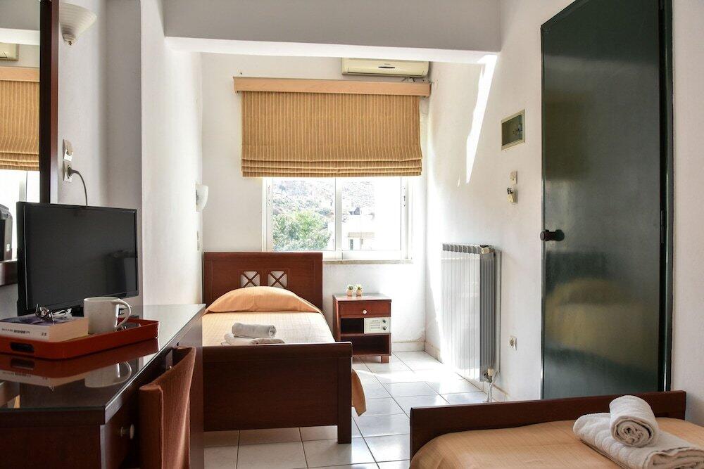 Foto de una habitación de Hermes Hotel