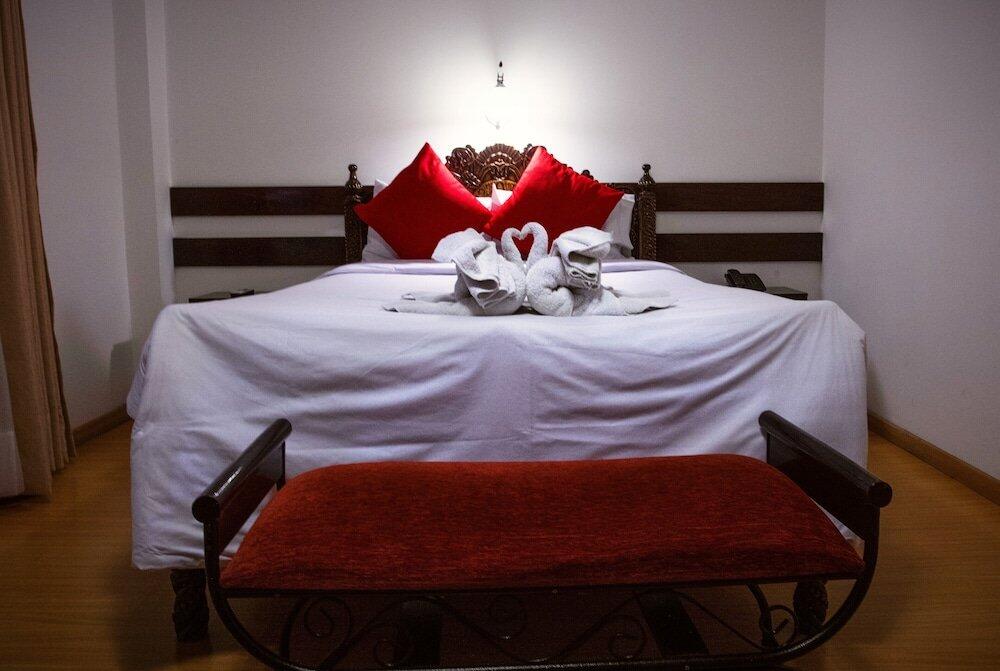 Foto de una habitación de Hotel Koyllur Inn