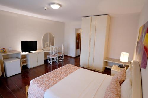 Foto de una habitación de Colonial Plaza Hotel