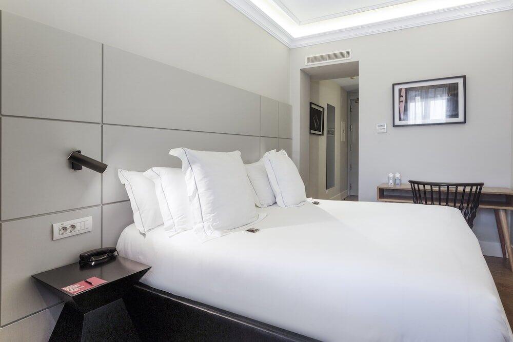 Foto de una habitación de Hotel One Shot Recoletos 04