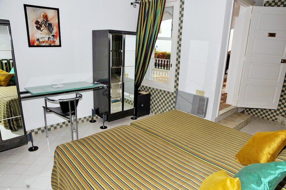 Foto de una habitación de Appart-Hôtel Tagadirt