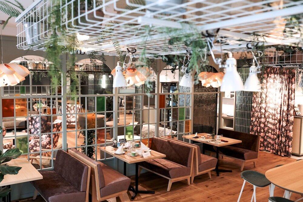Foto de restauración de Stadtoase Kolping Hotel