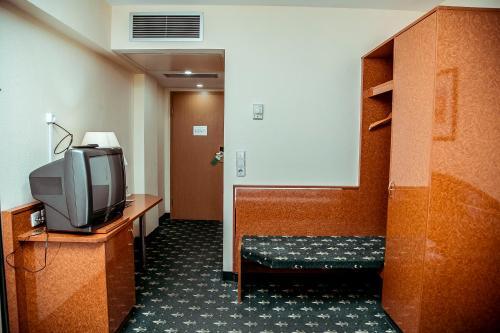 Foto de una habitación de Hotel Shodlik Palace