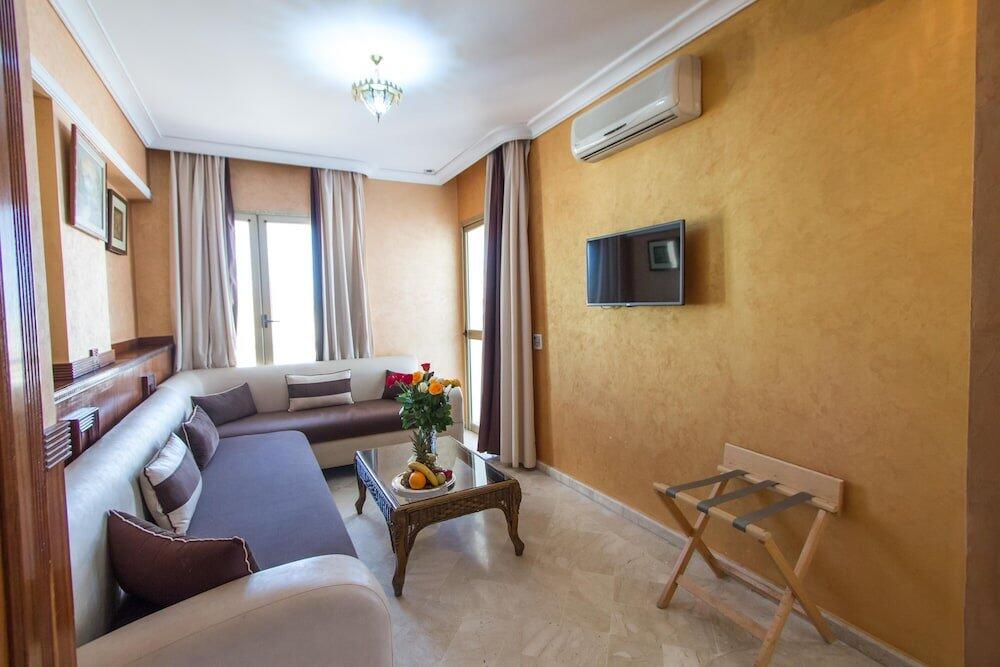 Foto de una habitación de Hotel Zahrat Al Jabal