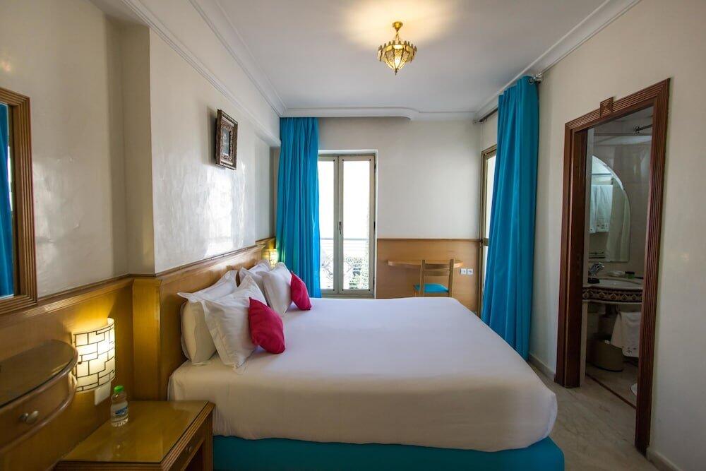 Foto de una habitación de Hotel Zahrat Al Jabal