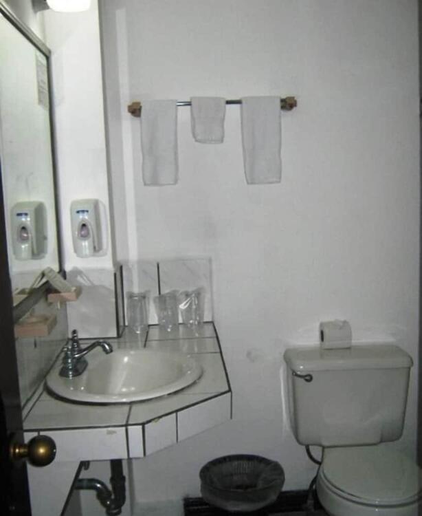 Foto del baño de Hotel America