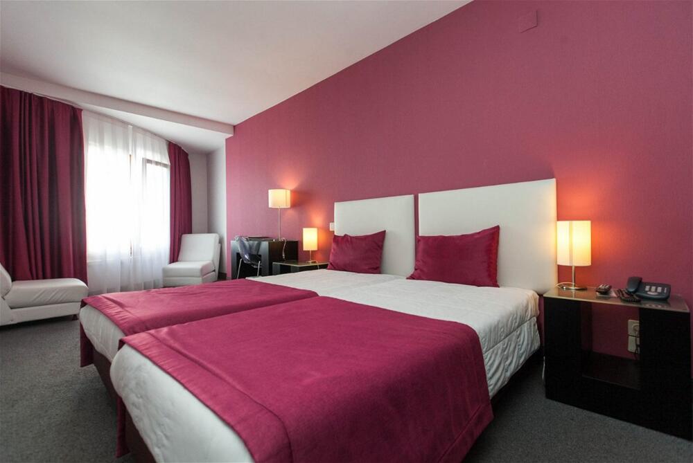 Foto de una habitación de Miramar Hotel Spa &amp;amp; Apartments