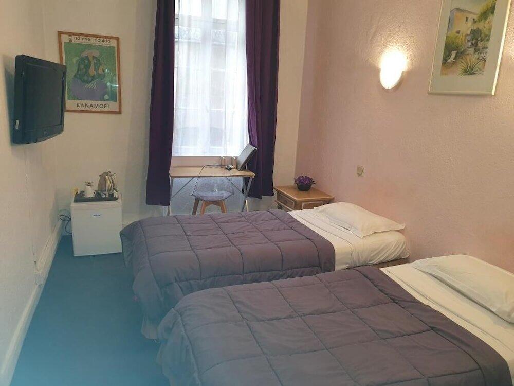Foto de una habitación de Hotel De France