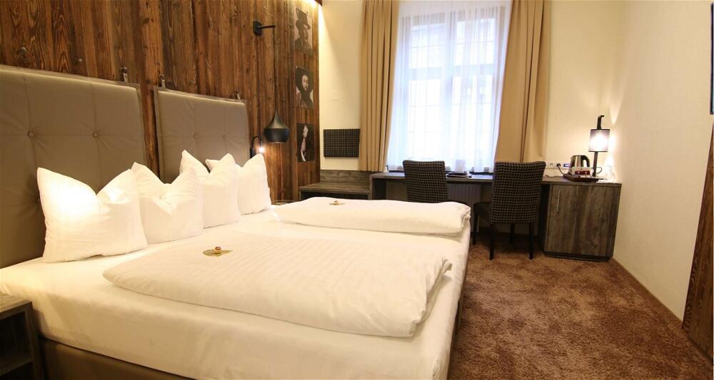 Foto de una habitación de Best Western Plus Hotel Goldener Adler